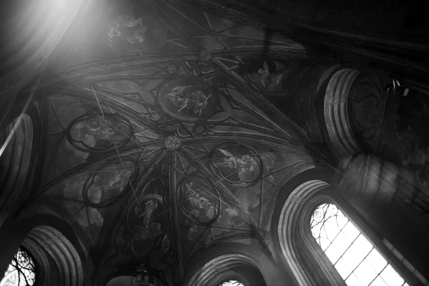 Black-and-white photograph with a dark, symbolic mood, referencing myth and personal transformation