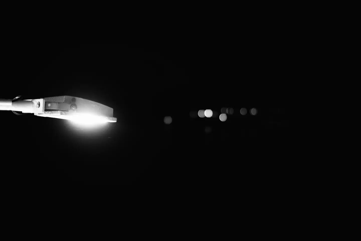 Black-and-white photograph with a contemplative, mythic mood